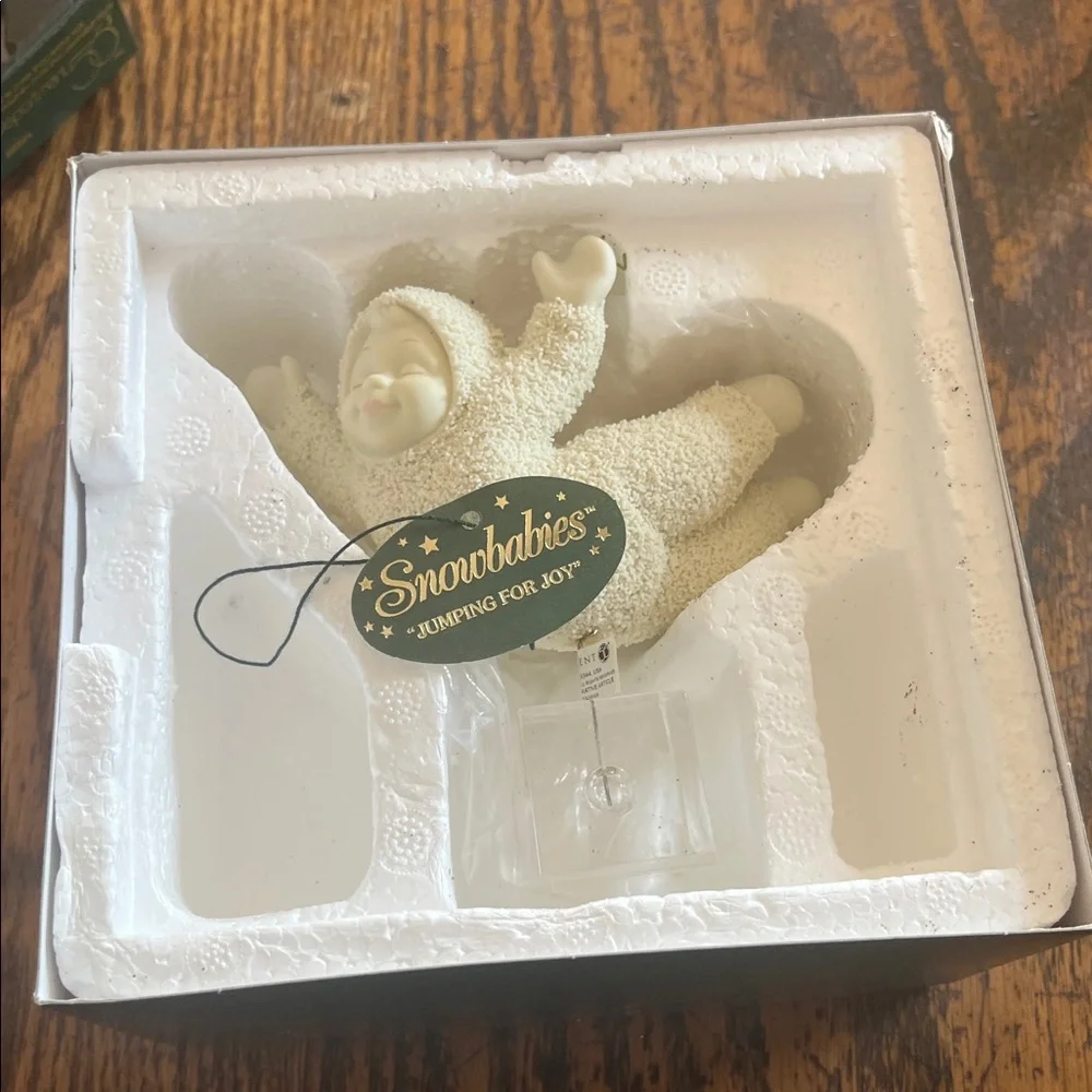 Snowbabies jumping for joy new in box